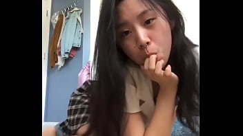 Naughty Asian Teen Wearing Skirt Masturbates